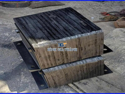 CAO SU GIẢM CHẤN DẠNG ÉP/DÁN LỚP