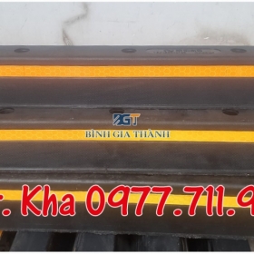 CỤC CHẶN LÙI BÁNH XE Ô TÔ